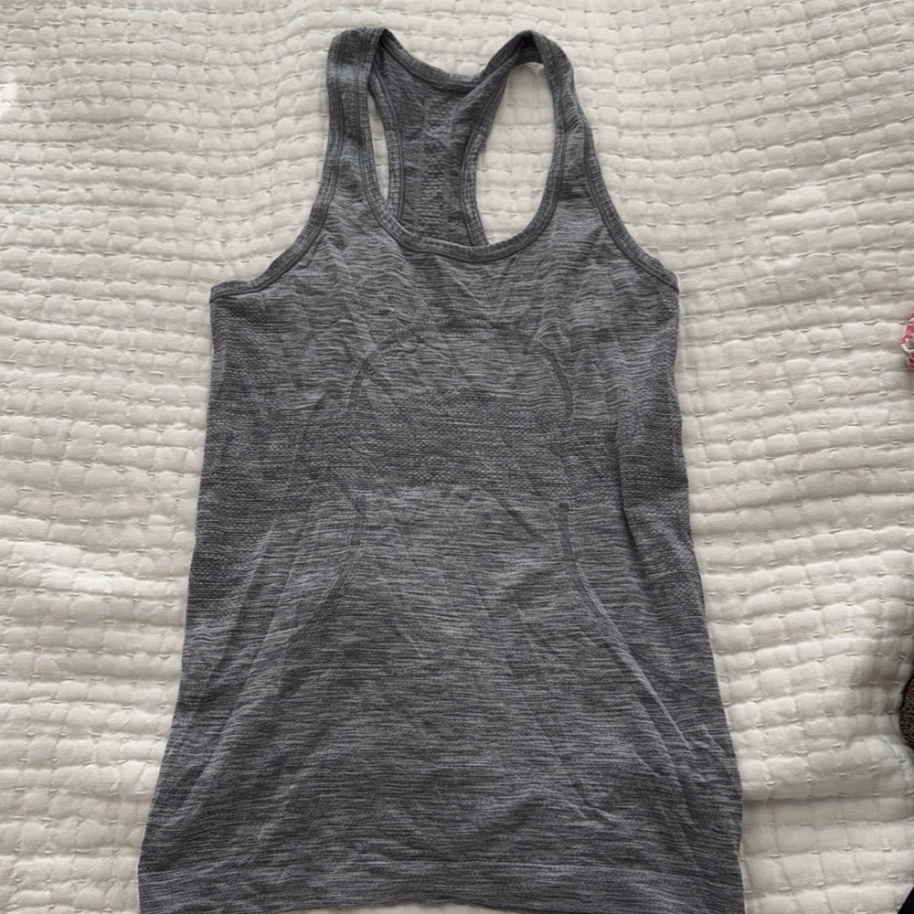Swiftly Tech Racerback Tank Top 2.0
Hip Length